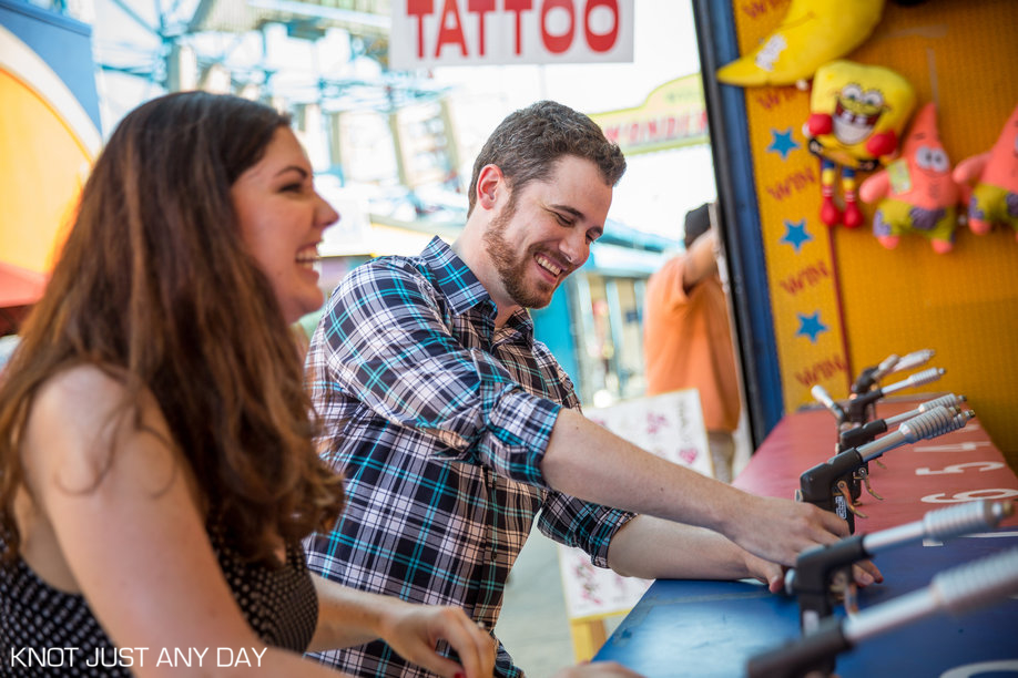 Knot Just Any Day | Engagement Photography | Coney Island | Brooklyn, NY | Engagement Photo | wonder wheel | Ferris Wheel | arcade | classic coney island | engagement photo idea | inspiration engagement photo