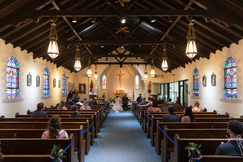 A traditional Catholic wedding mass performed under social distancing guidelines during COVID-19.