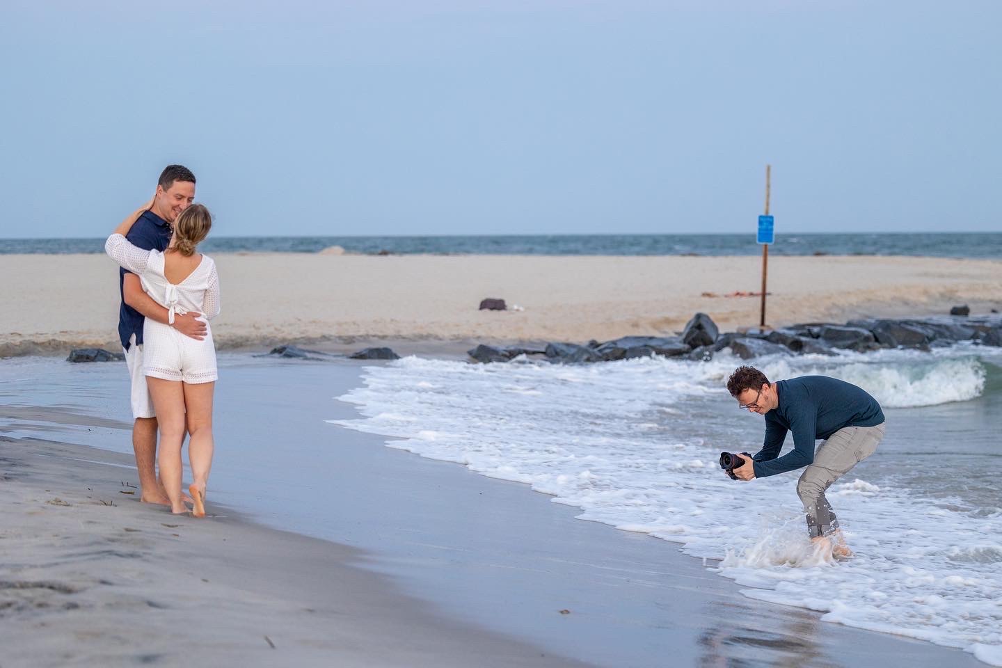 wedding photographer during engagement session in Cape May, NJ